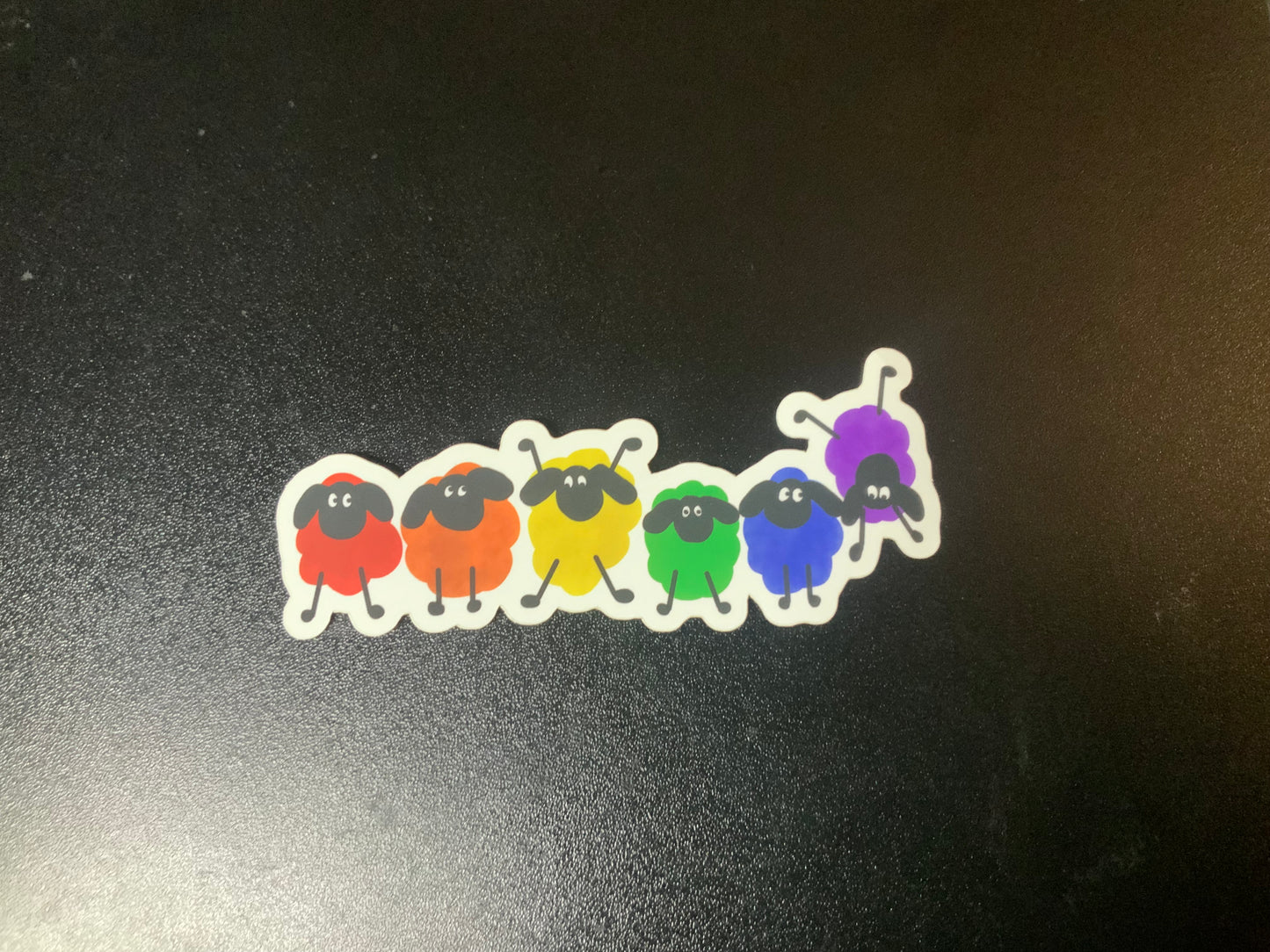 Rainbow Frolicking Sheep matte vinyl sticker 4.5” x 2”
